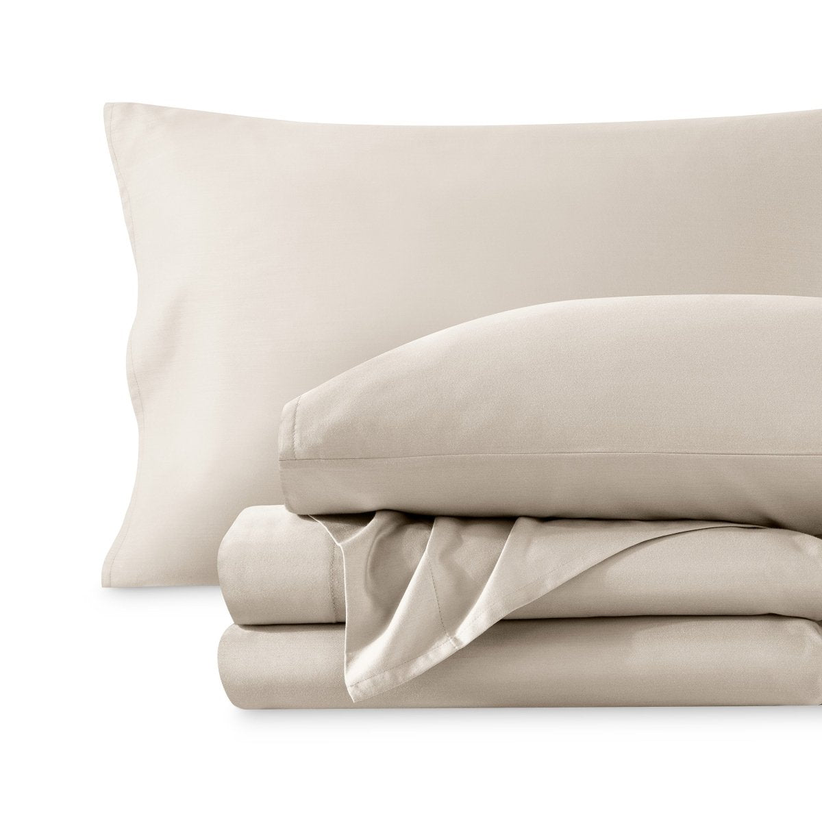 A sateen sheet set folded and stacked on a white background.