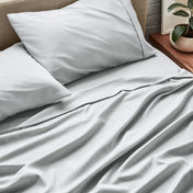 Close up of ultra-soft sheets on a bed