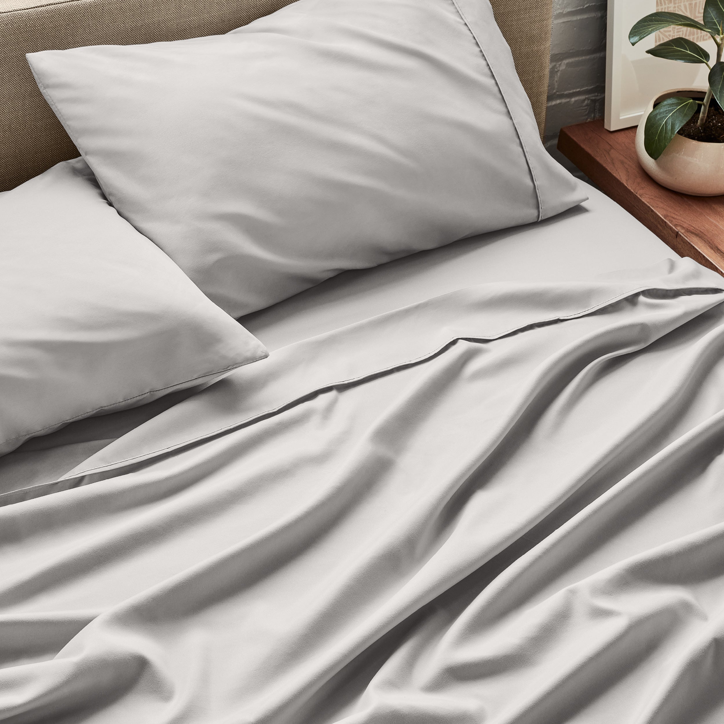 Close up of ultra-soft sheets on a bed