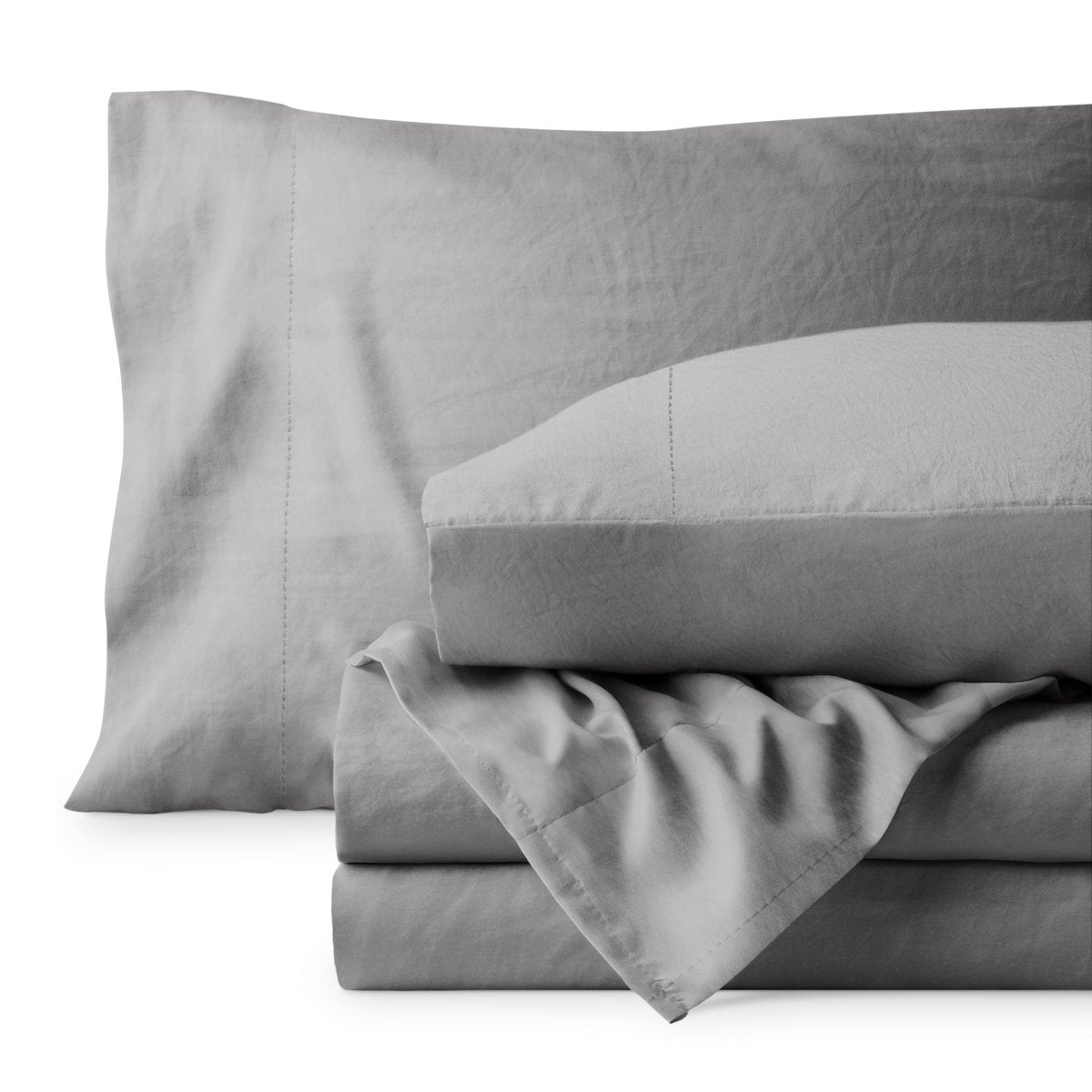 Washed microfiber sheet set folded and stacked on a white background