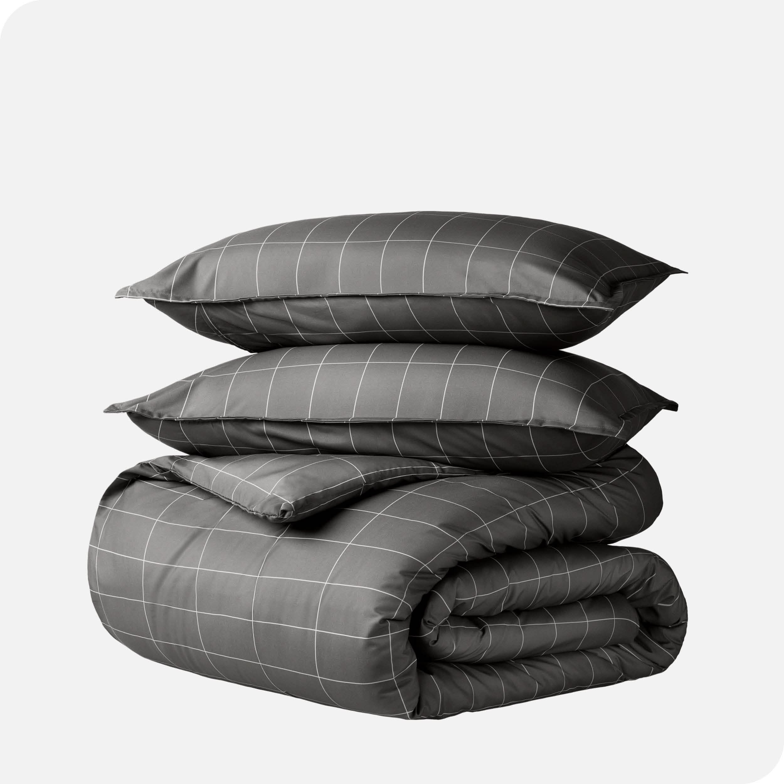 A duvet cover set folded and stacked