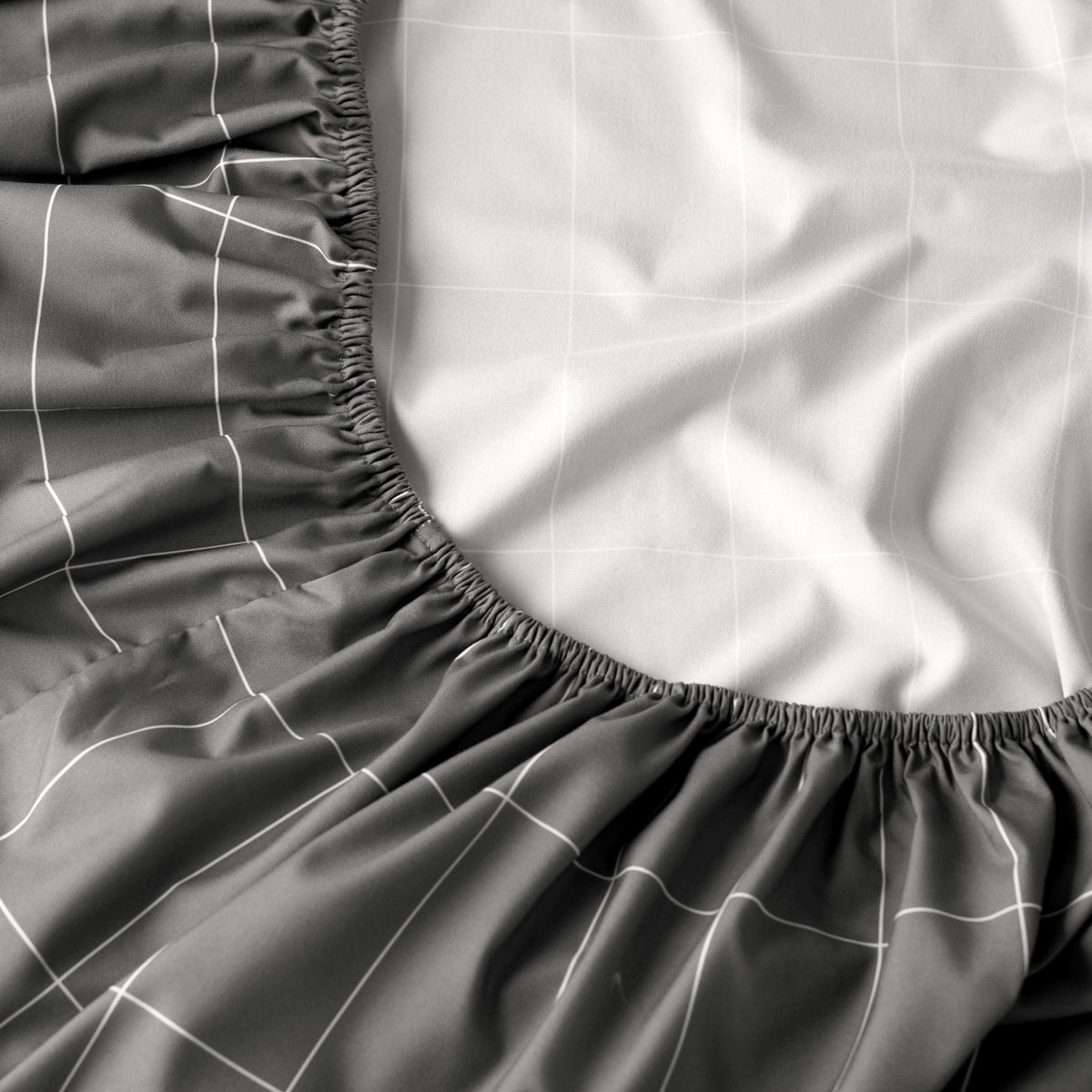 Close-up of fitted sheet with all around elastic