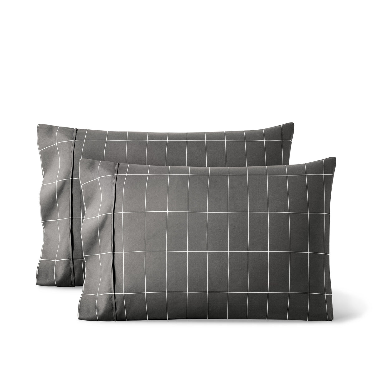 2 printed pillowcases against a white background