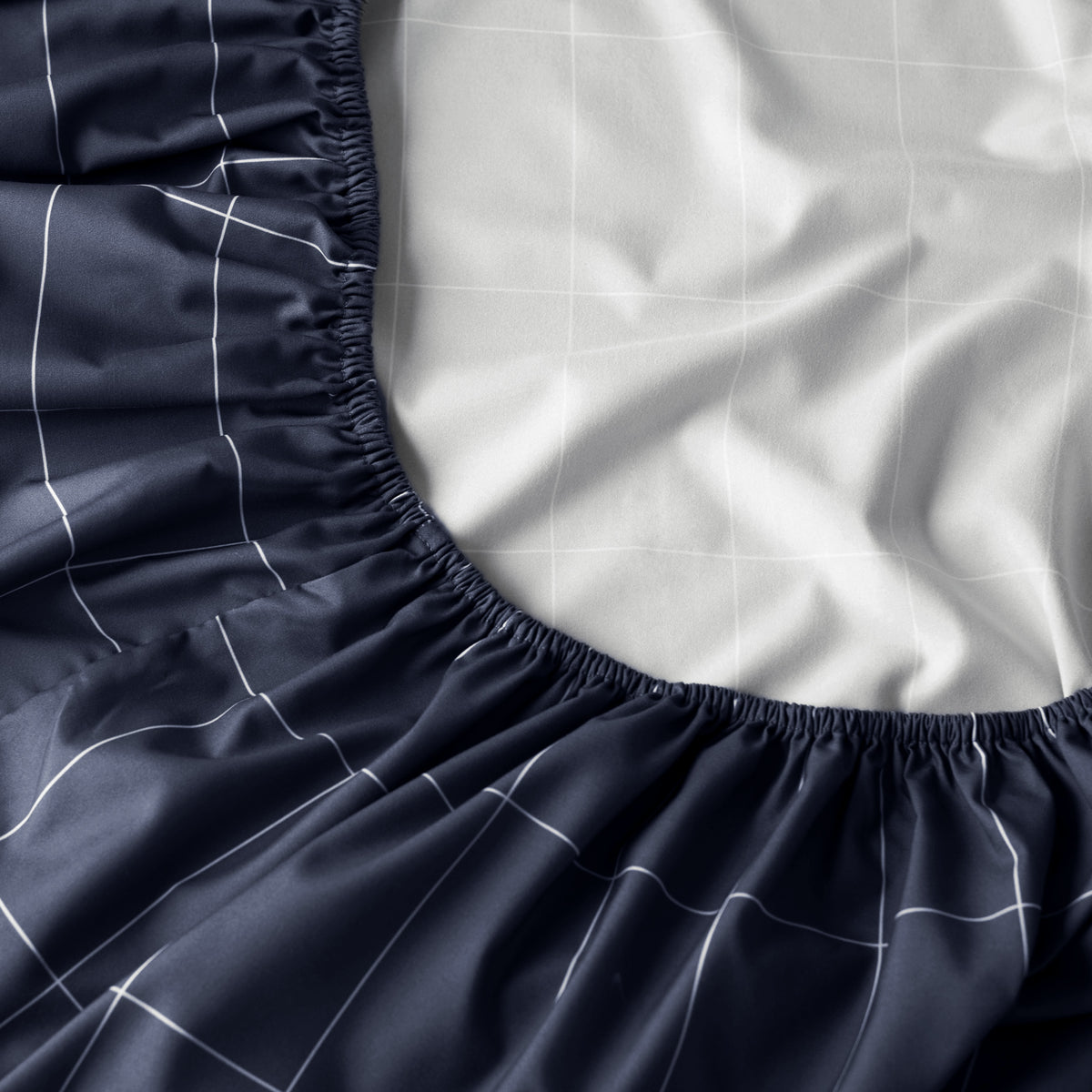 Close-up of fitted sheet with all around elastic