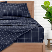 Printed sheets on a bed