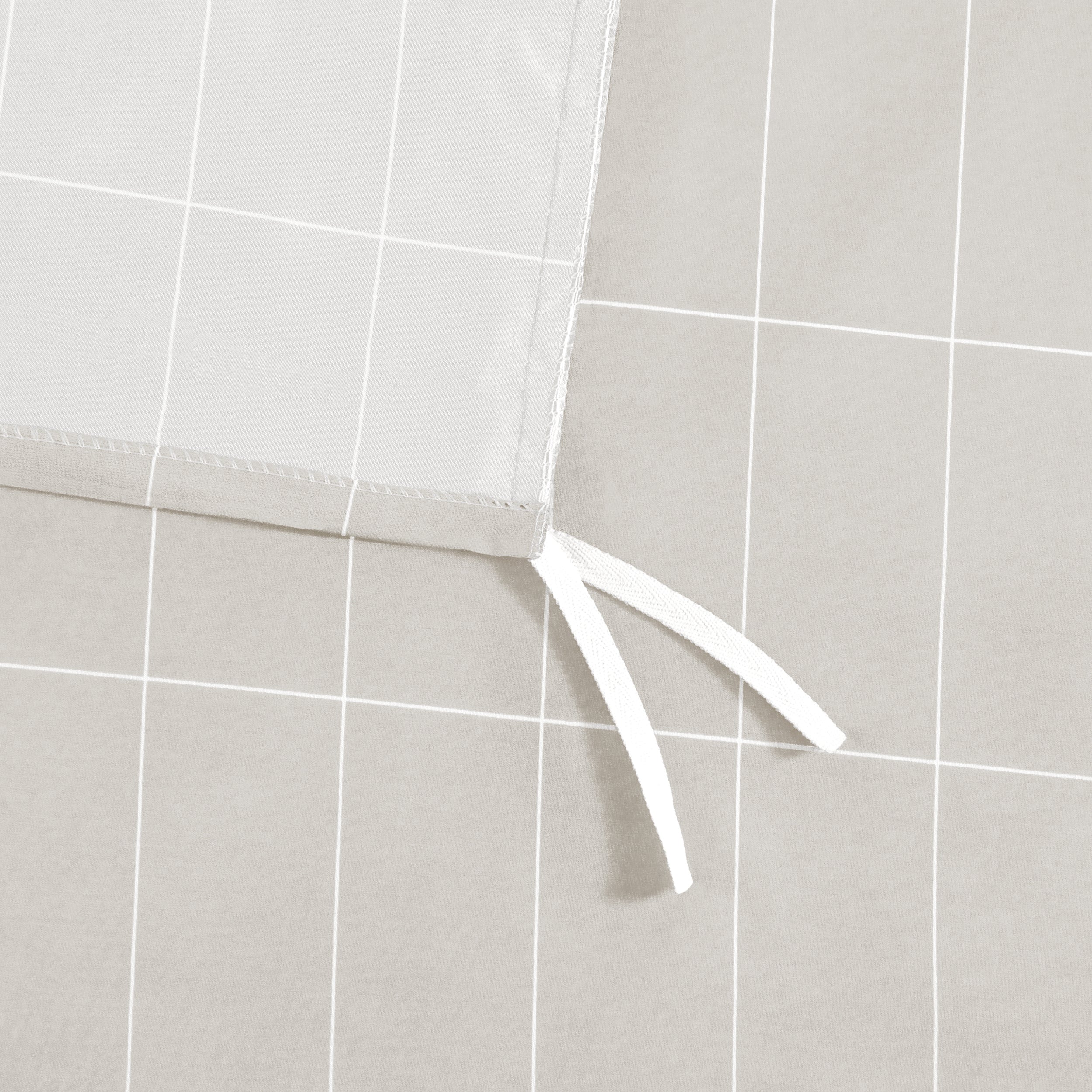 Close up of the ties on a duvet cover