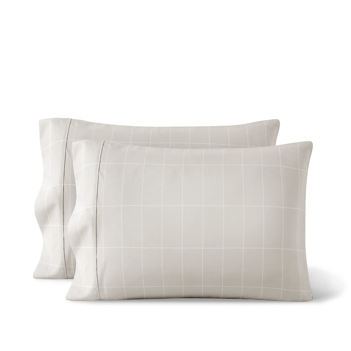 Two printed pillowcases on a white background