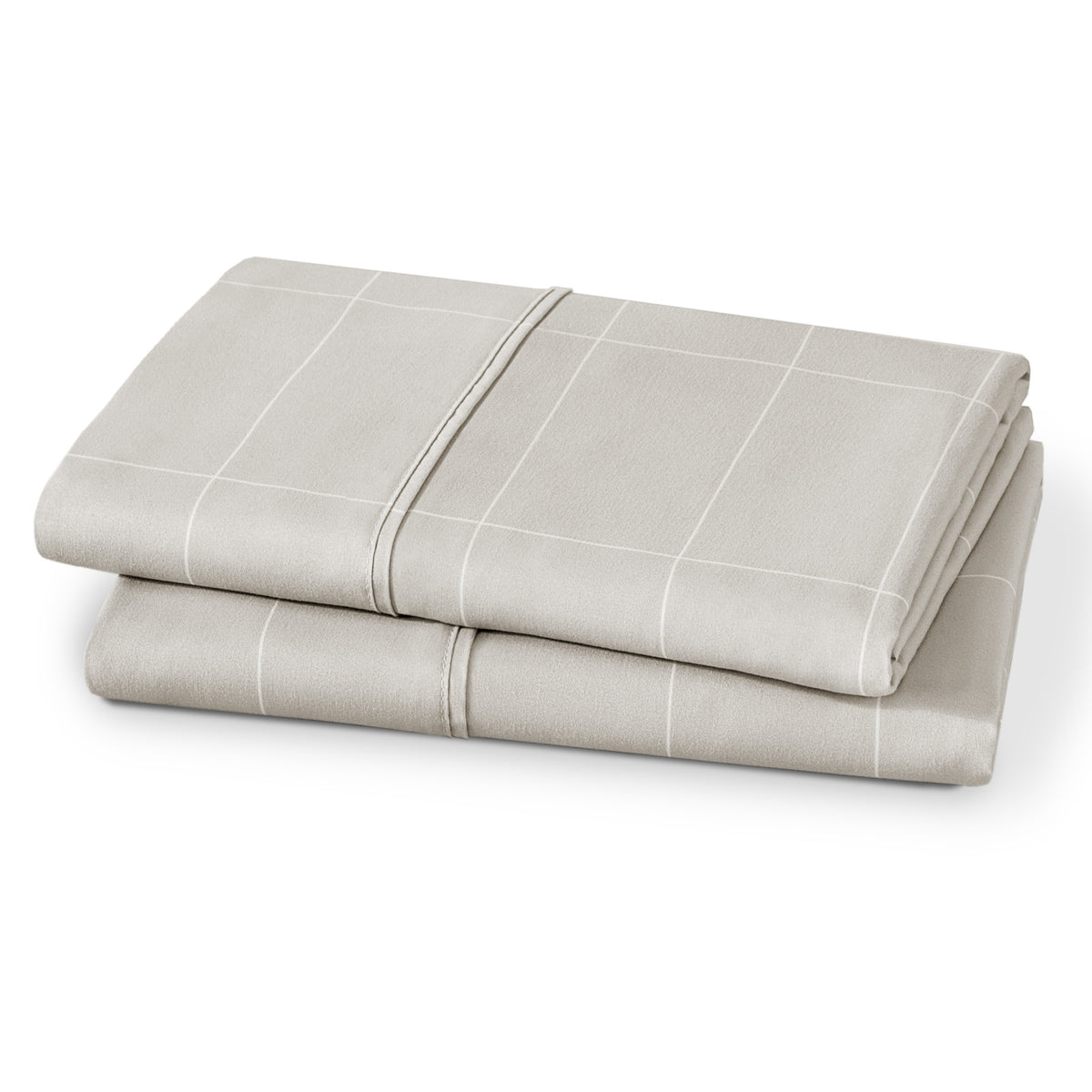 Folded pillowcases on a white background