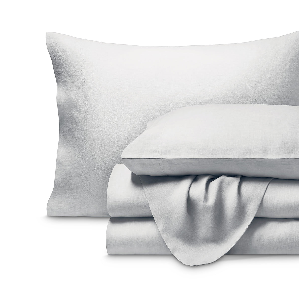 Linen sheet set folded with a white background