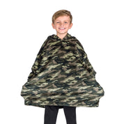 A boy wearing a blanket made of microplush, showcasing comfort and warmth.