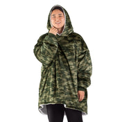 An adult with a sherpa wearable blanket on