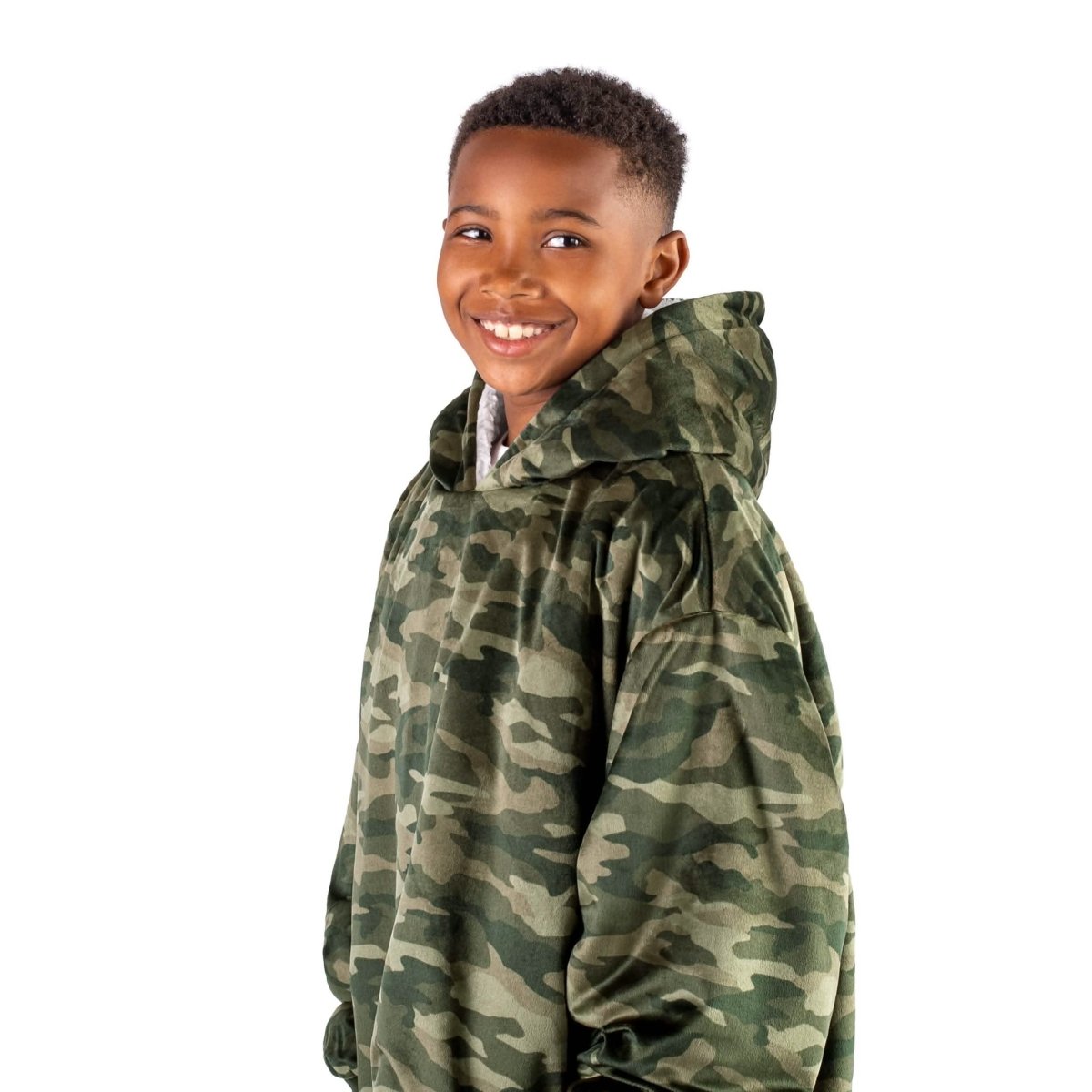 A child with a wearable blanket on