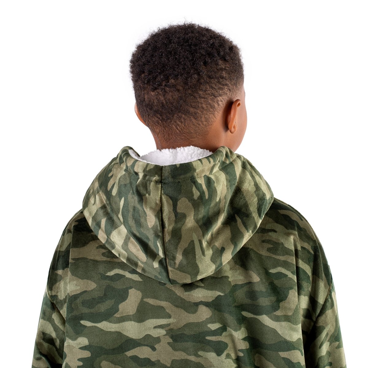 A child with a sherpa wearable blanket on