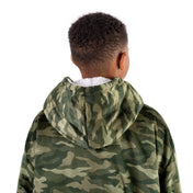 A child with a sherpa wearable blanket on