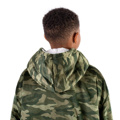 A child with a sherpa wearable blanket on