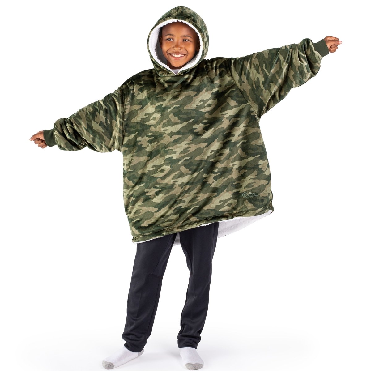 A child wearing a hooded blanket