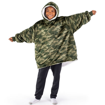 A child wearing a hooded blanket