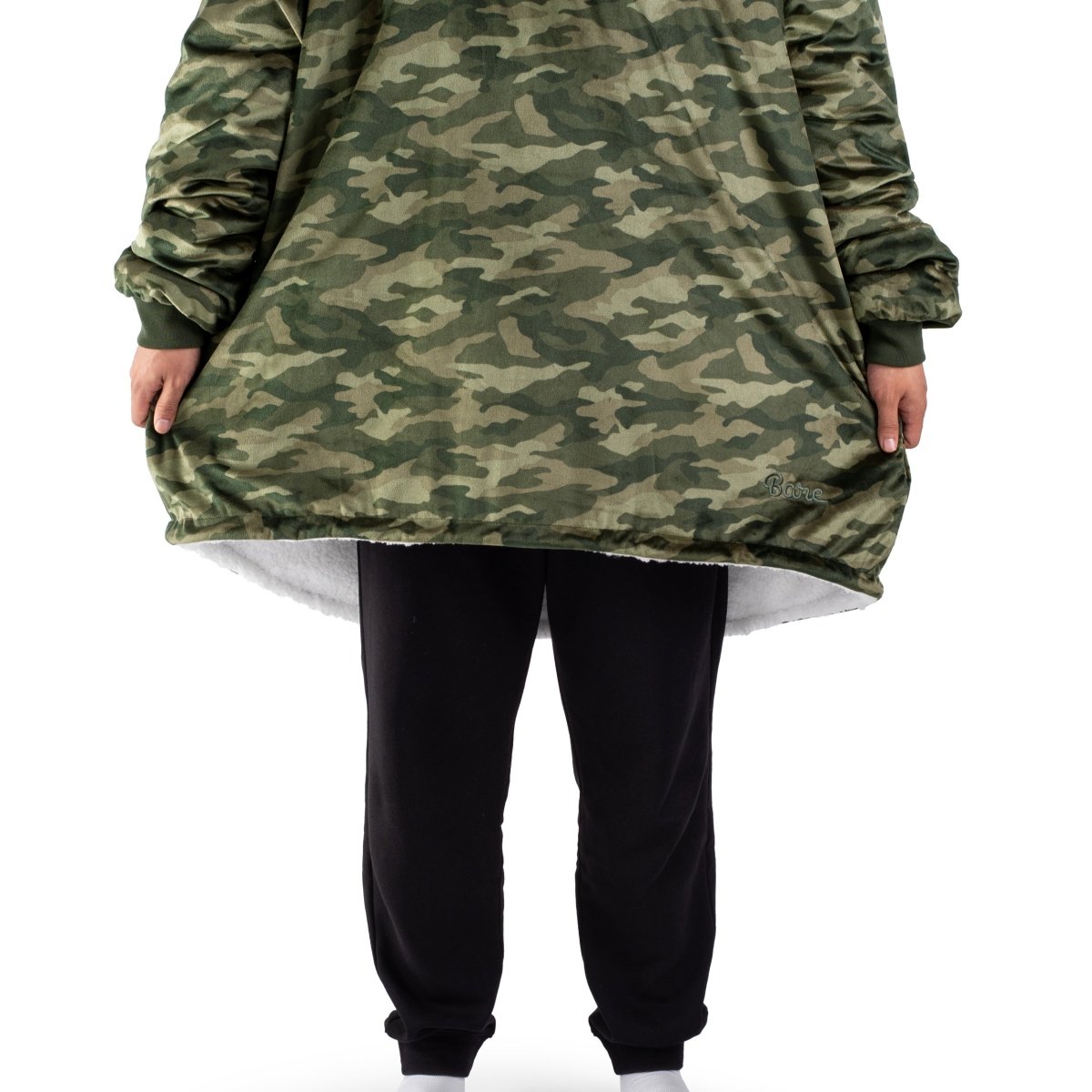 Child wearing a Bare Home wearable blanket