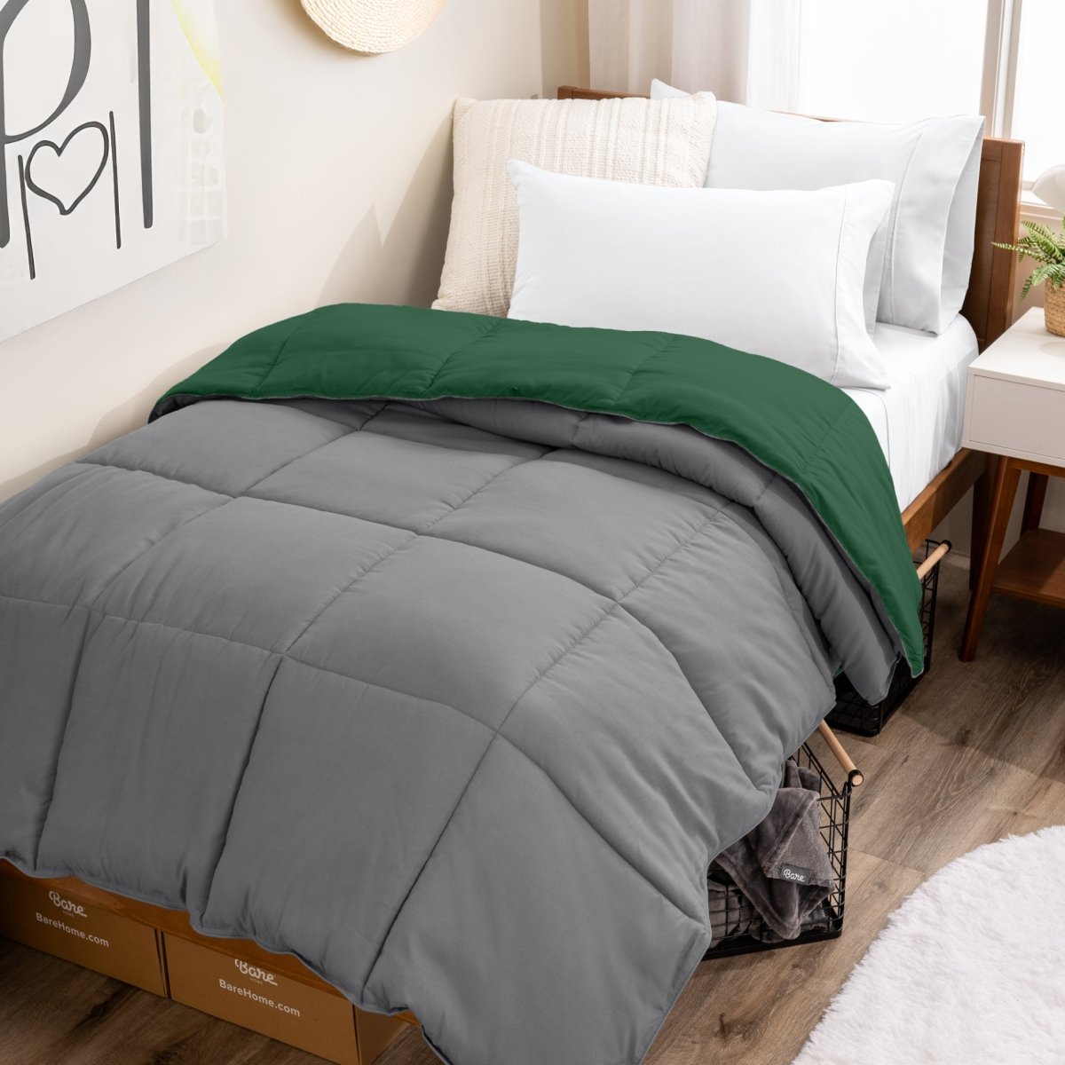 College dorm room with a reversible comforter on the bed