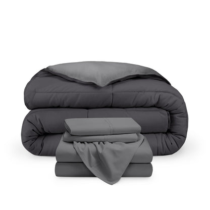 A reversible microfiber comforter and a coordinating sheet set folded and stacked