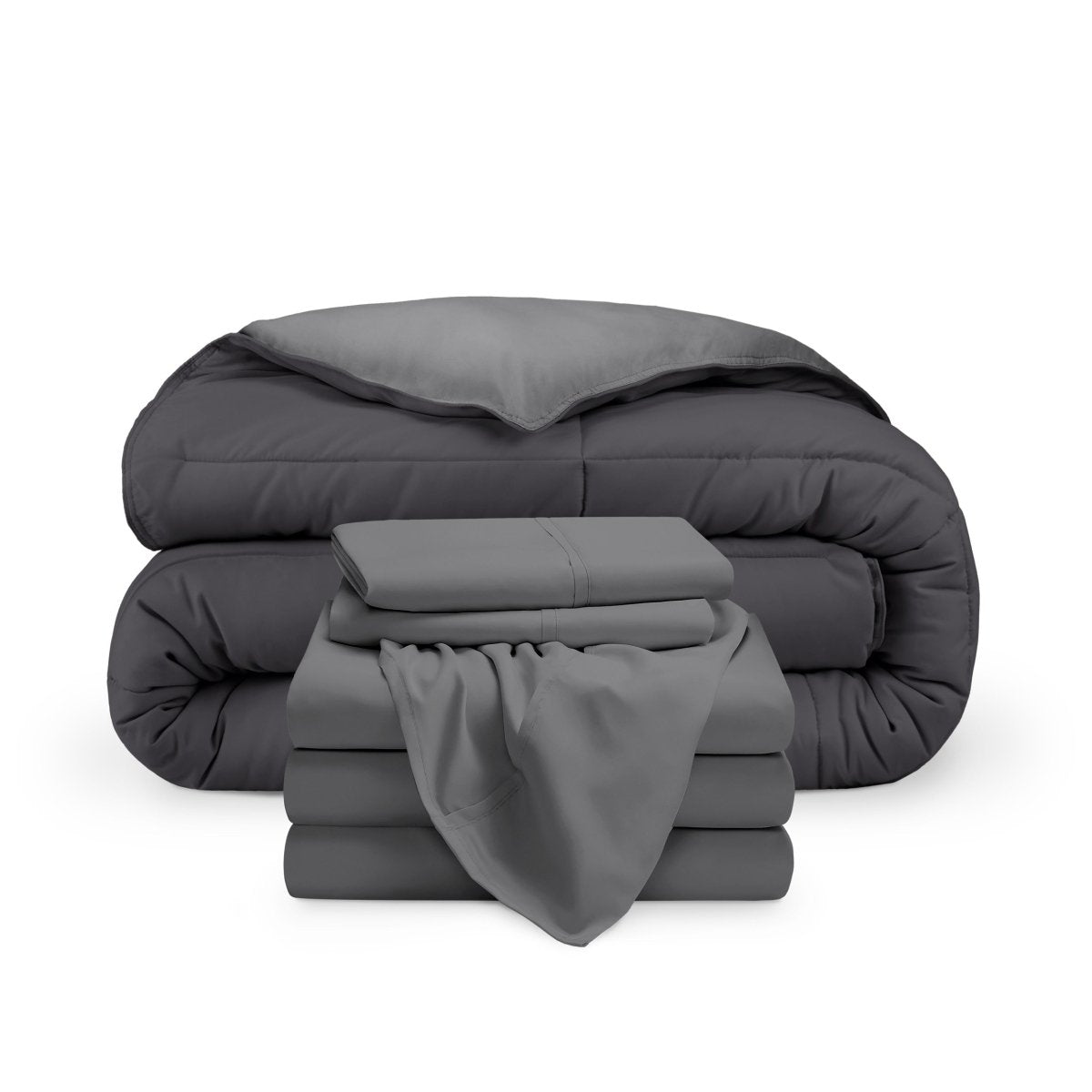A reversible microfiber comforter and a coordinating sheet set folded and stacked
