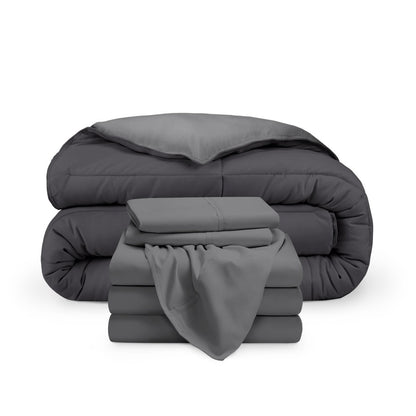 A reversible microfiber comforter and a coordinating sheet set folded and stacked