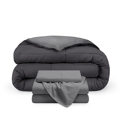 A reversible microfiber comforter and a coordinating sheet set folded and stacked