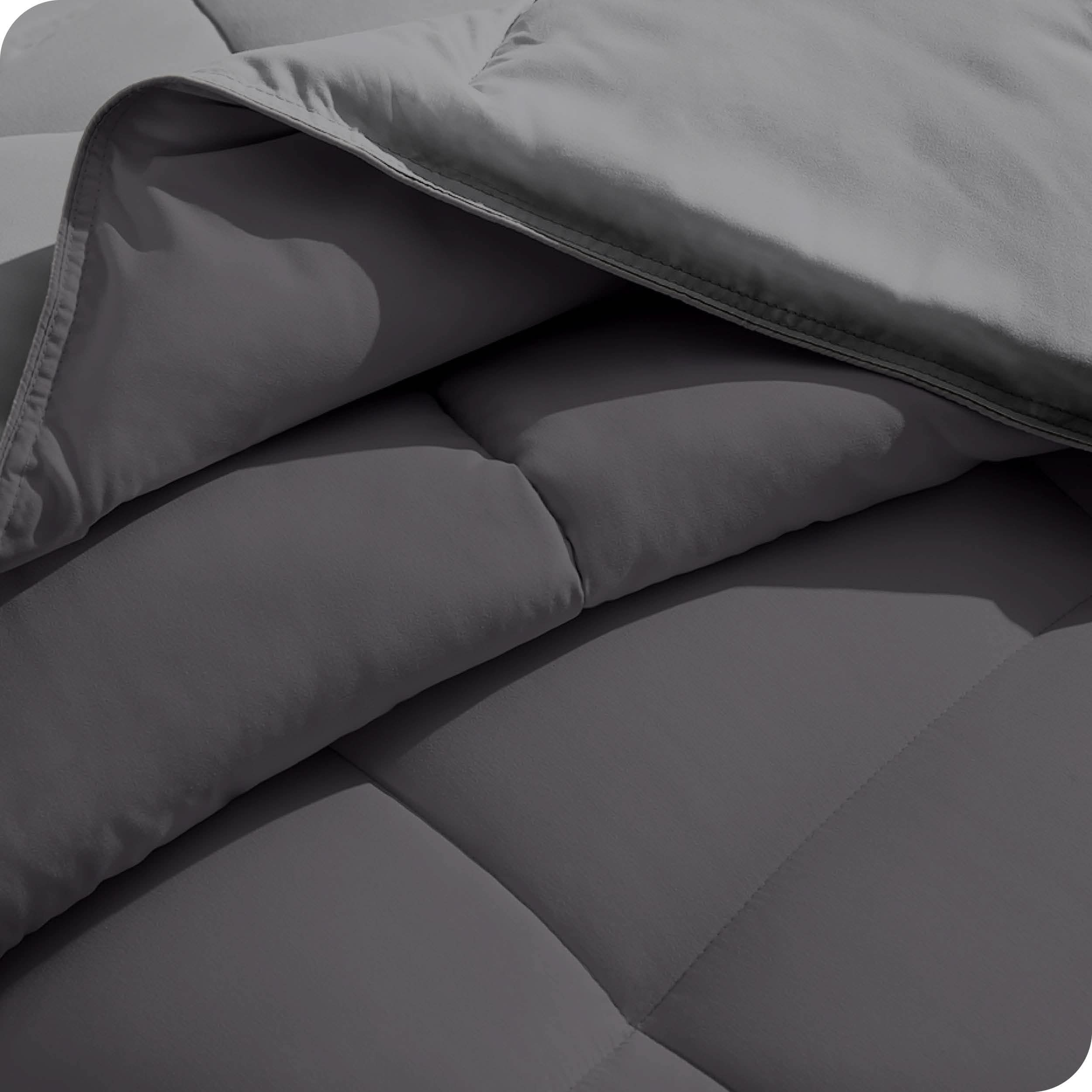 Close up of the comforter folded back showing the two different colored sides