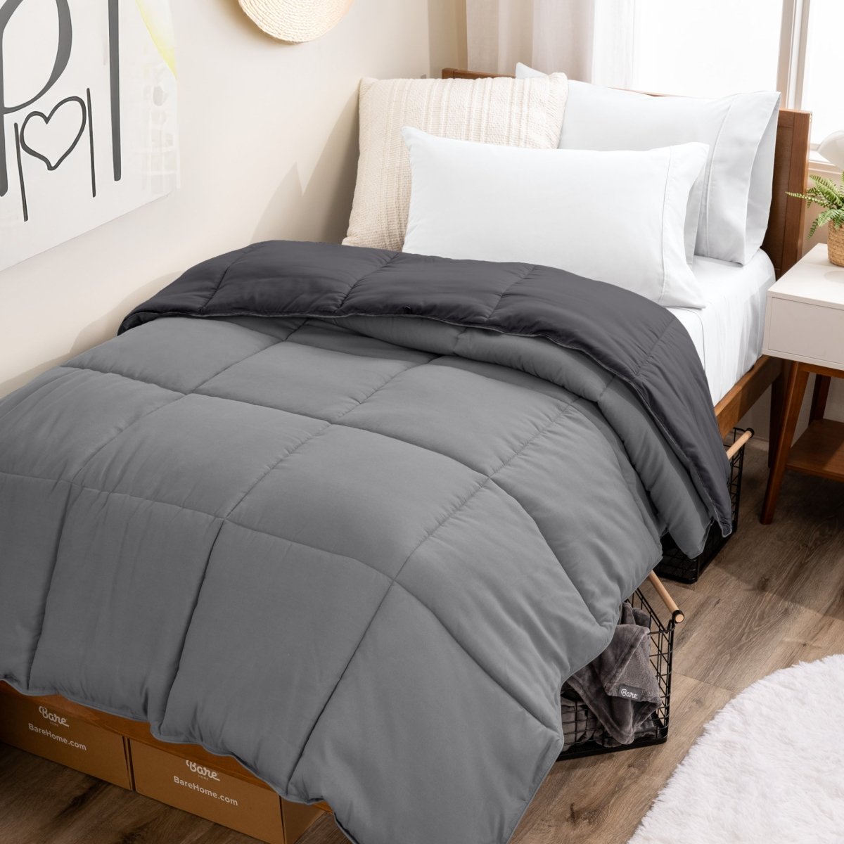 College dorm room with a reversible comforter on the bed