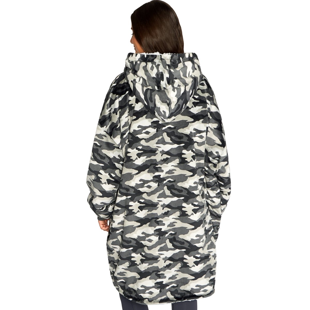Person wearing a hooded blanket on a white background