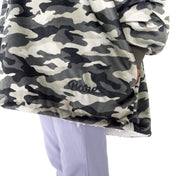 Close up of a sherpa wearable blanket on a child