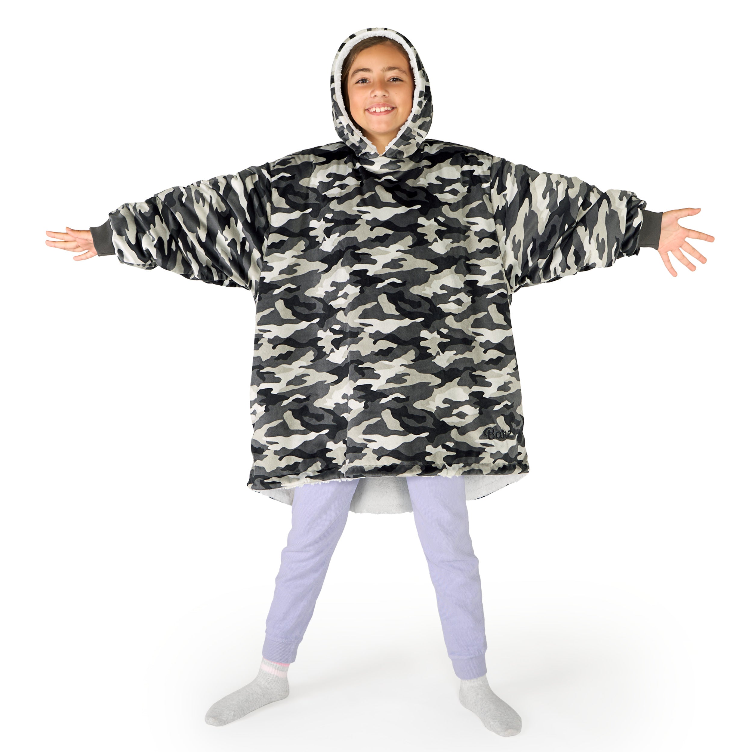 A child wearing a hooded blanket
