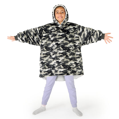 A child wearing a hooded blanket