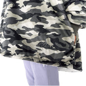 Child wearing a Bare Home wearable blanket