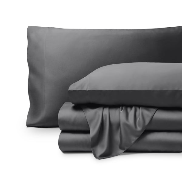 Bamboo pillowcases and sheets set on a white background