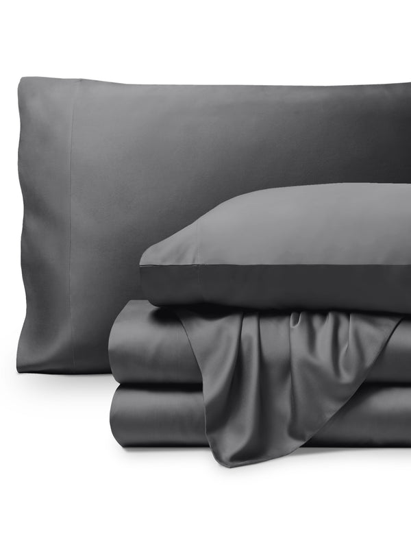 Bamboo pillowcases and sheets set on a white background