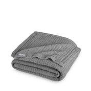 A cotton waffle blanket folded