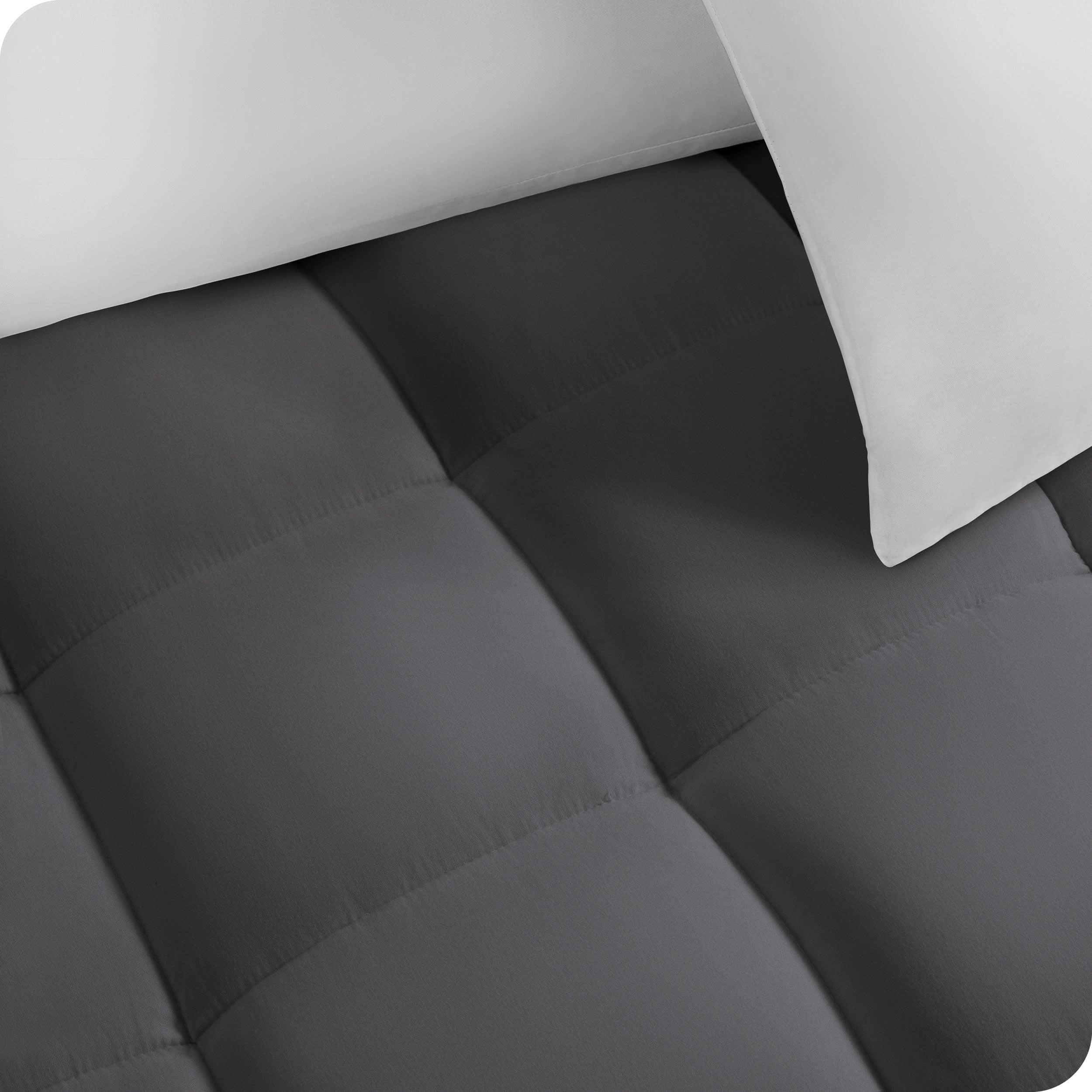 Close up of a cotton mattress pad showing the box-stitching.