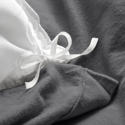 Close-up of the ties on a flannel duvet cover
