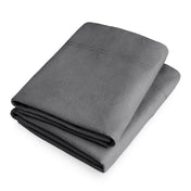 Folded flannel pillowcase set on a white background