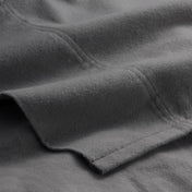Close-up of flannel fabric with a focus on texture and color.