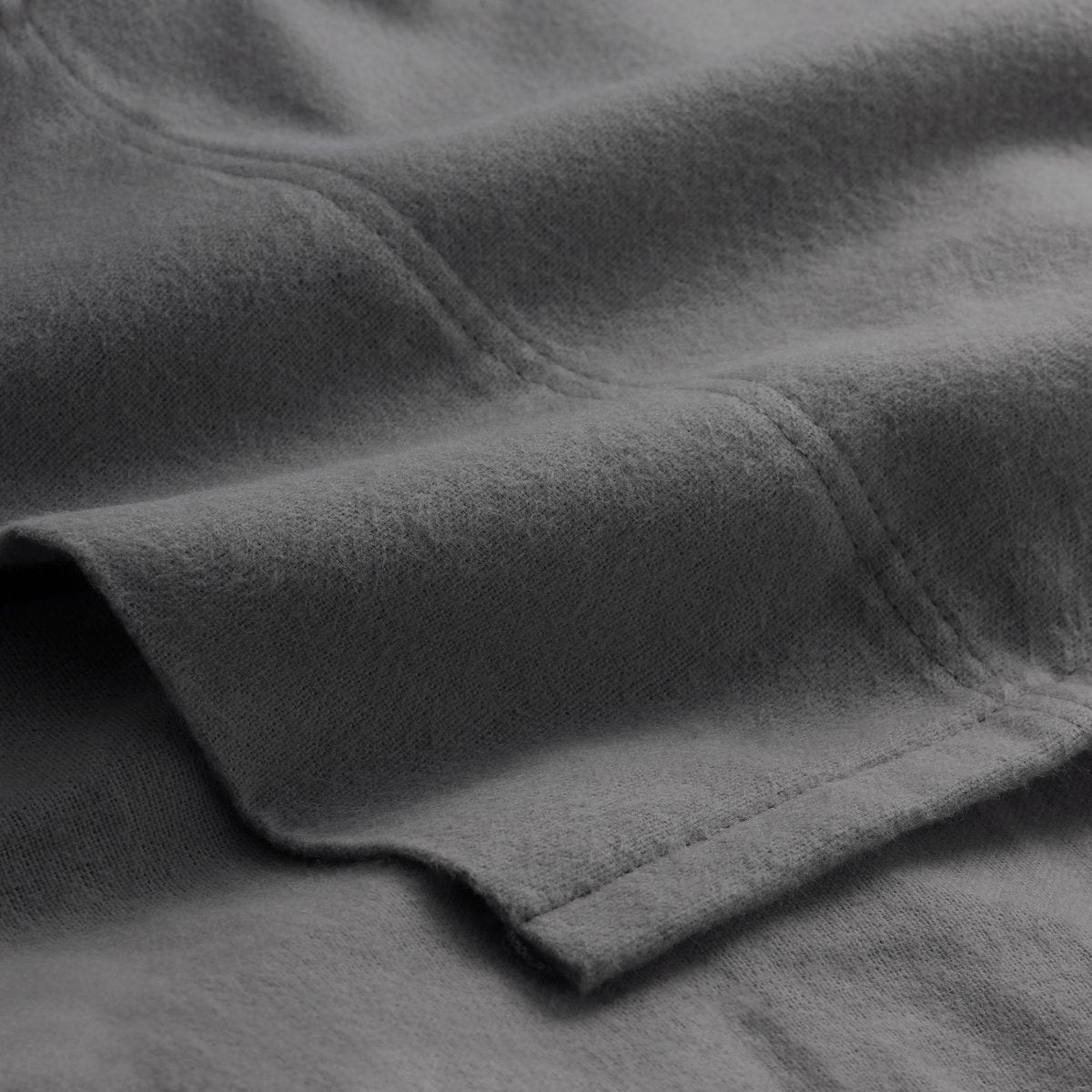 Close-up of flannel fabric with a focus on texture and color.