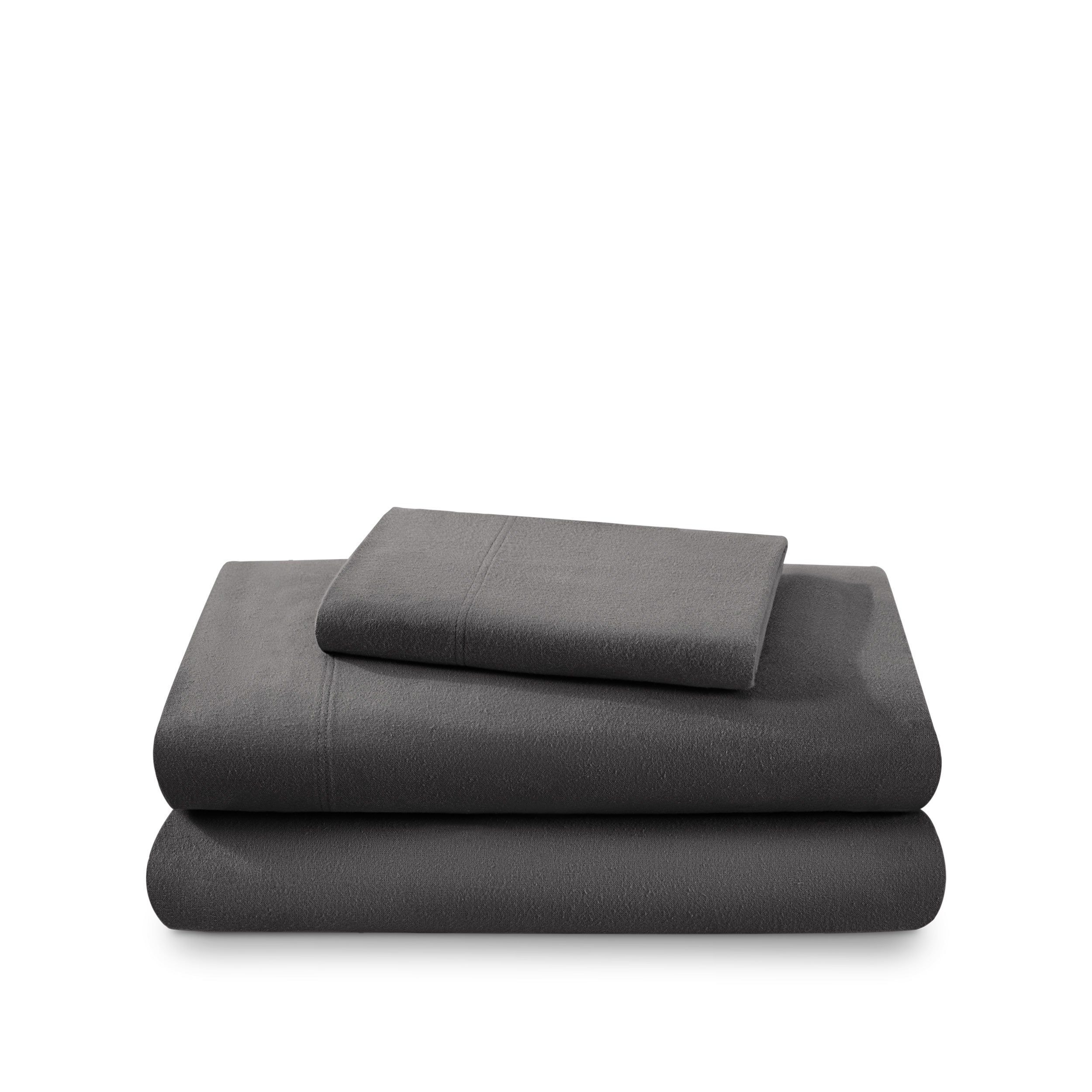 Cotton flannel sheet set folded and stacked on a white background