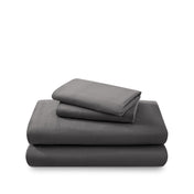 Cotton flannel sheet set folded and stacked on a white background