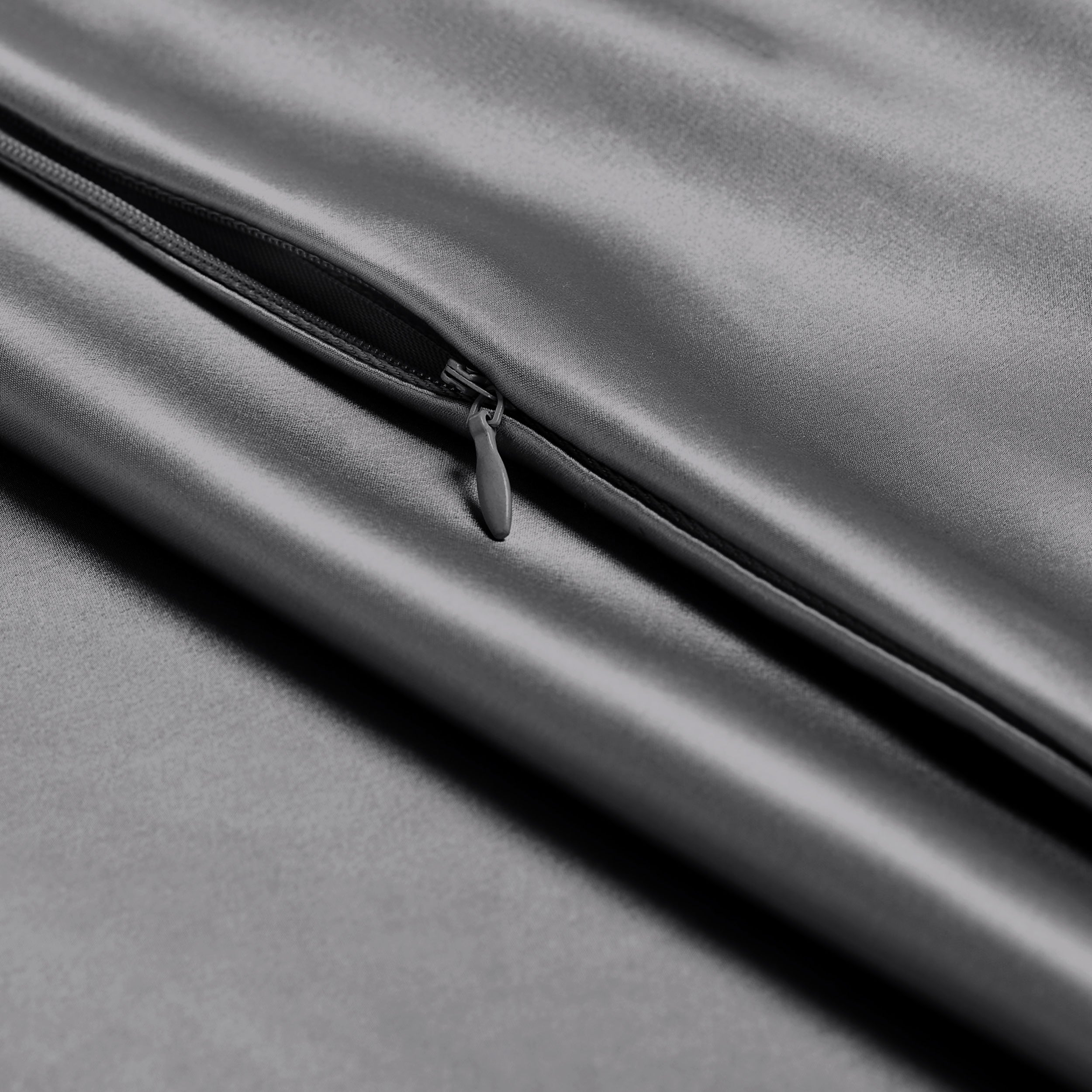 Close-up of a silk pillowcase with a zipper