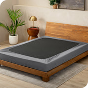 Grey box spring cover on a box spring