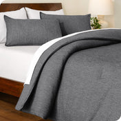 A comforter set on a bed