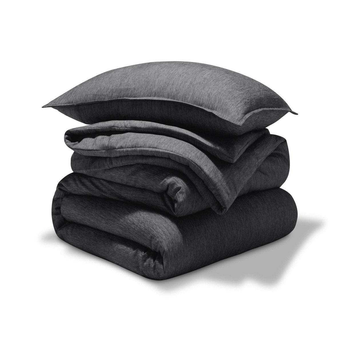 A comforter set folded and stacked