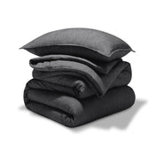 A comforter set folded and stacked