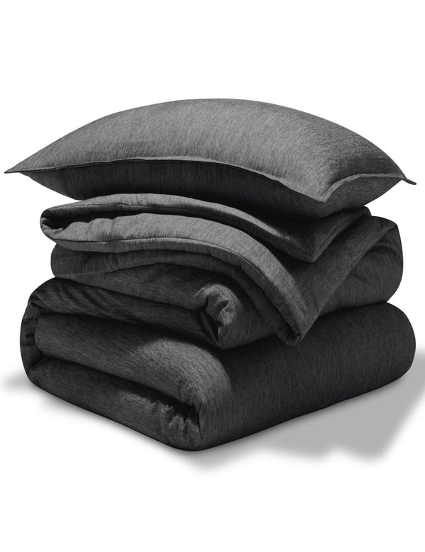 A comforter set folded and stacked